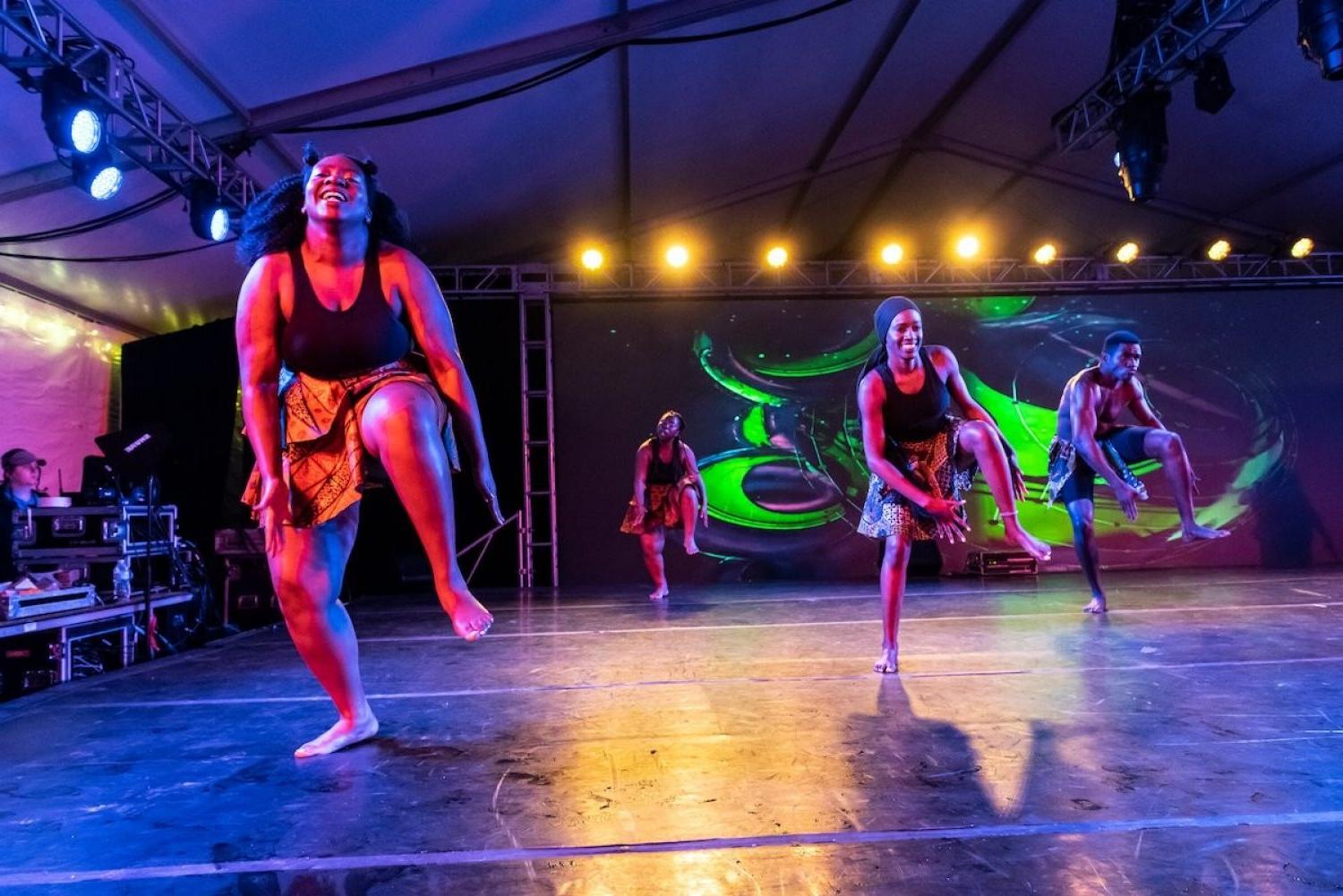 A group of dancers on stage