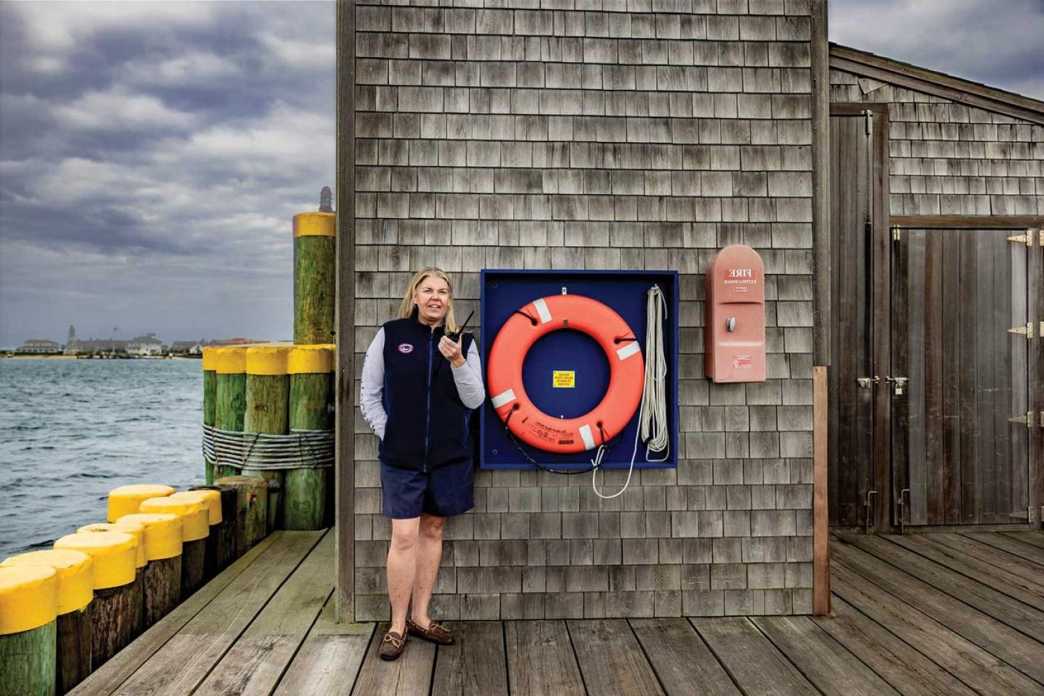 Photo of Christina Martin on the docks of Nantucket Harbor 